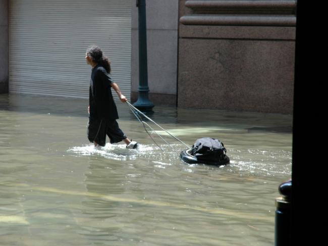 refugee in flood, disparity in natural hazards (Getty Images)