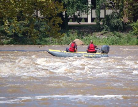 Rescue team in a boat on flood waters